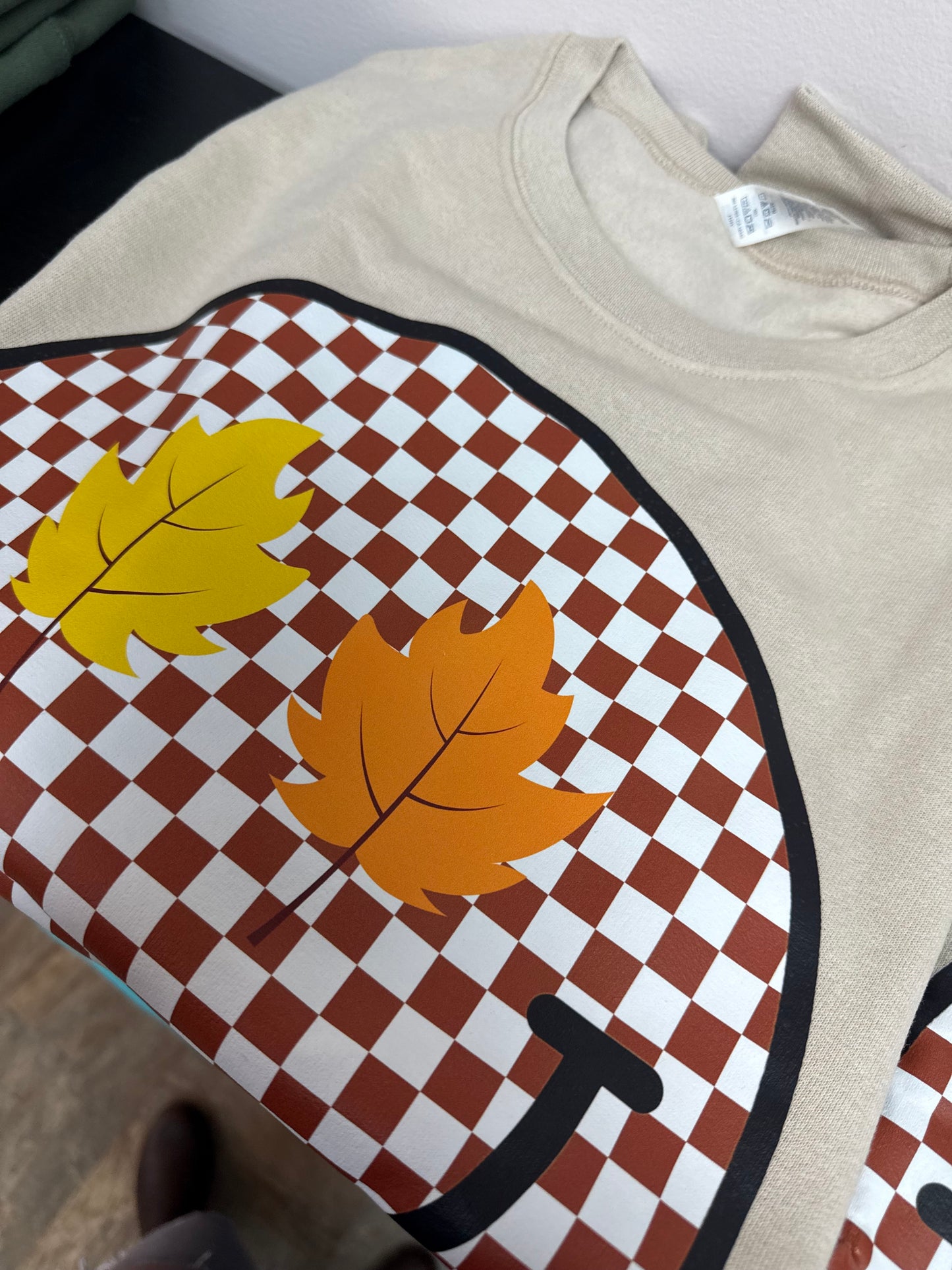 Brown Checkered Happy Face Crewneck