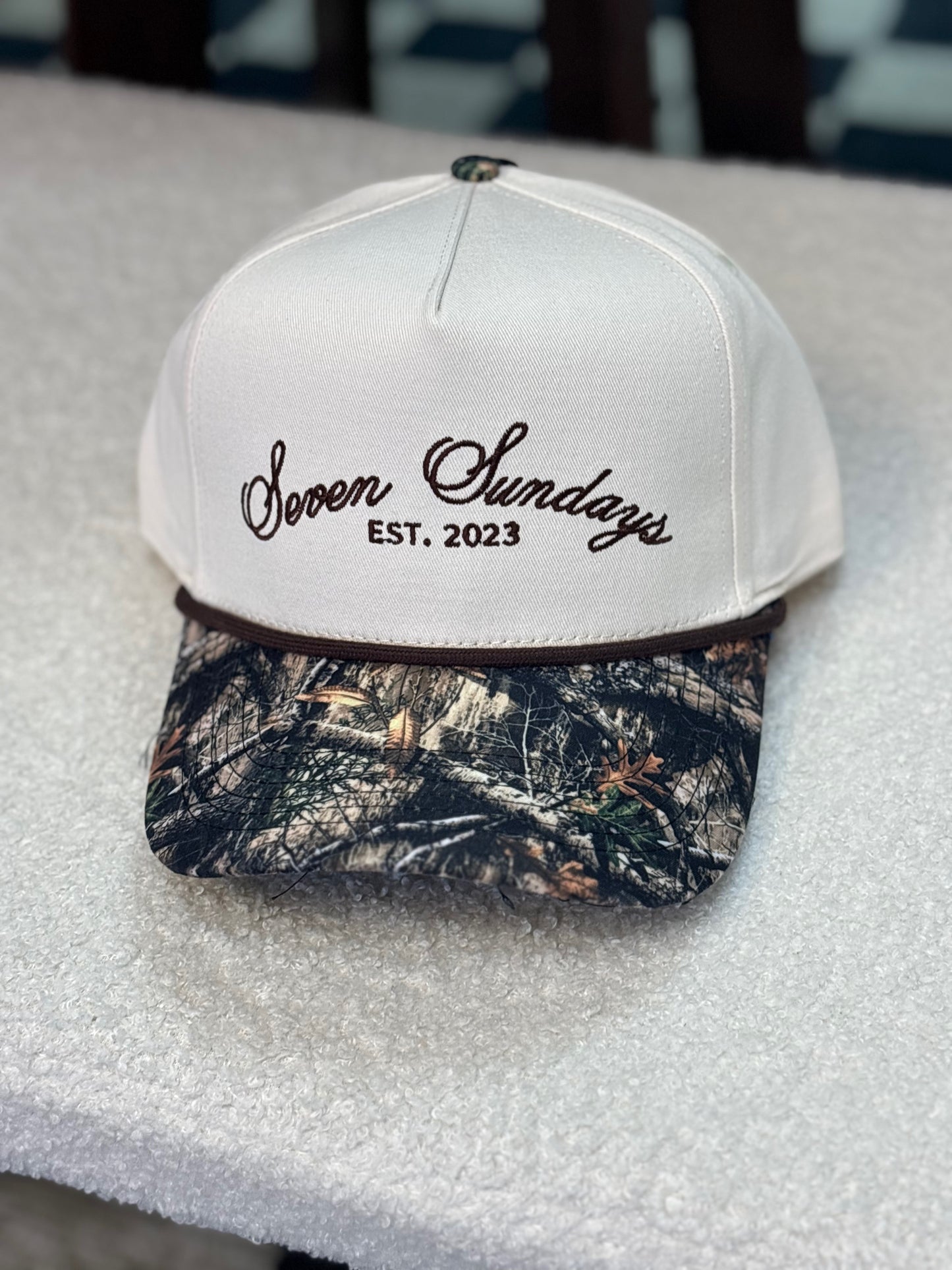 Seven Sundays Trucker Hat - White w/ Camo Beak & Brown Roping
